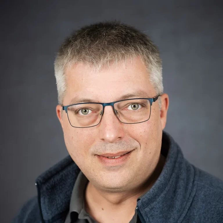 Porträtfoto von André Gand.